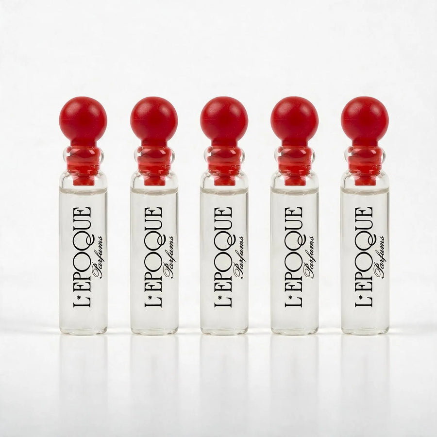 Five L'Epoque Parfums branded 1mL sample vials with red ball caps from the Discovery Set