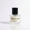 Serotonin Spritz Eau de Parfum 30mL bottle by L'Epoque — clear glass flacon with a black cap and cream label on a soft white background